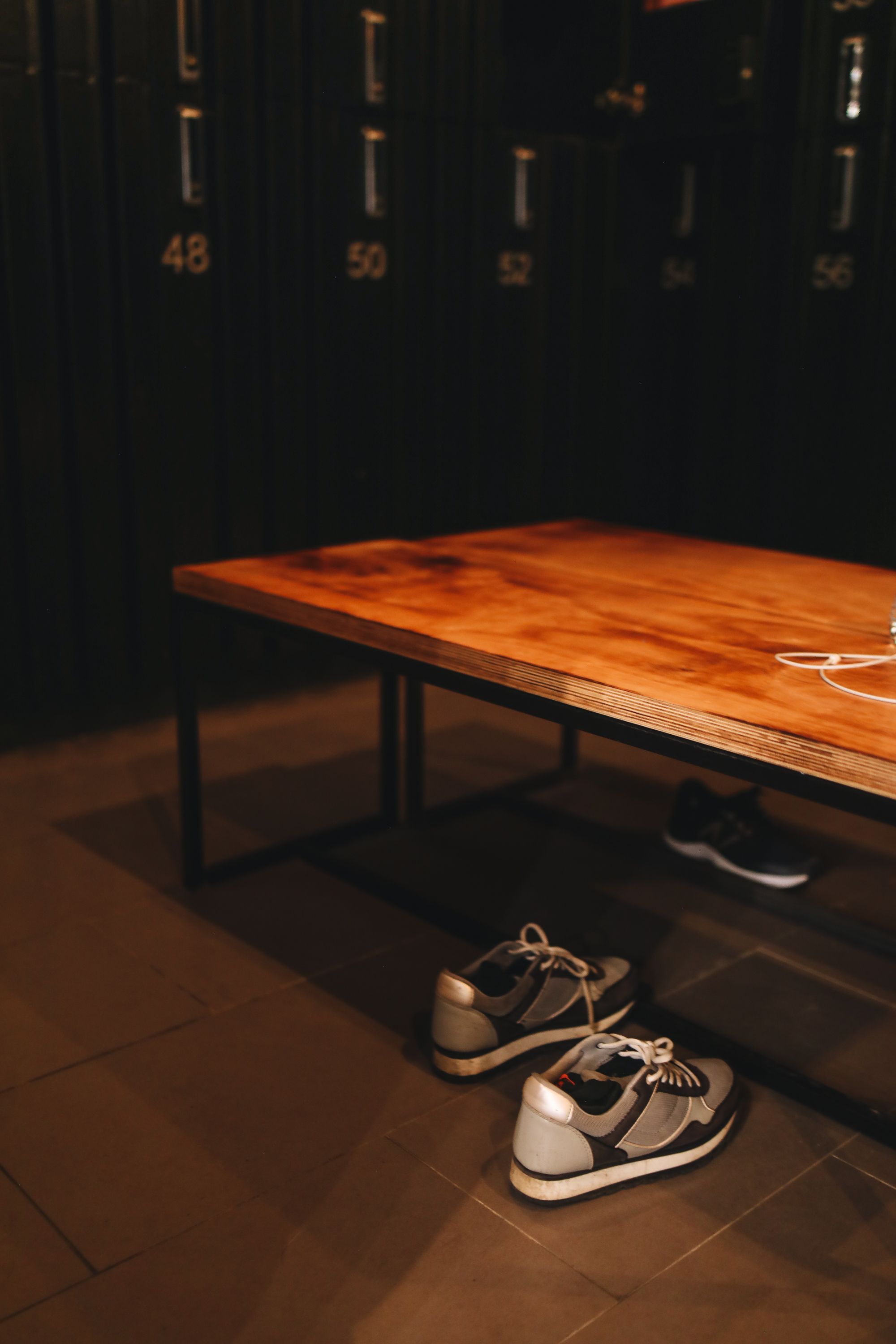 Illustrative locker-room trainers, no SOTHING product